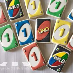 decorated cookies with the numbers 1, 2, 3 and 4 are arranged on a table