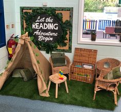 the children's play area is set up with chairs and a teepee tent