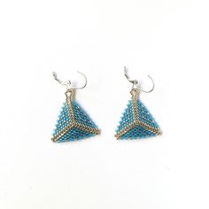 Blue Hypoallergenic Beaded Earrings As Gift, Elegant Triangle Beaded Earrings Gift, Elegant Triangle Beaded Earrings For Gift, Hypoallergenic Blue Beaded Earrings For Gift, Elegant Triangular Beaded Earrings For Gift, Handmade Light Blue Dangle Earrings, Nickel-free Blue Beaded Earrings As Gift, Nickel-free Blue Beaded Earrings For Gifts, Blue Triangle Earrings For Gift