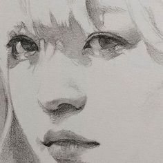 a pencil drawing of a woman's face