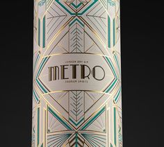 a close up of a bottle of alcohol on a black background with the word metro printed on it