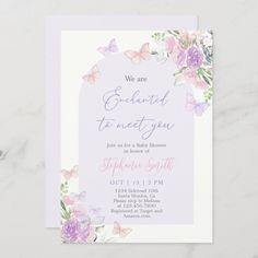 a purple and white floral baby shower with butterflies