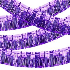 purple and white photograph of tooth brushes