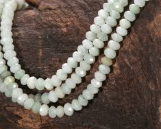 Classic and ever-popular jade in an easy-to-use cut and size! Add to dainty beaded bracelets, elegant earrings, and more. Prized in Asian cultures for thousands of years, Jades are actually found in many different regions of the world. Burma Jade beads can be pleasing hues including lighter tones of creamy white and light mint. They also come in darker shades of sage and can be as dark as dried tea leaves. Jade is actually a catch-all term for two seperate stones - jadeite and nephrite. Jades are formed in metamorphic rocks. They are composed of fine-grained crystal structures. The distinctive green color of jade is actually caused by impurities of chromium. Myanmar (Burma) is the top source of Jades, including this variety. Metaphysically, jades are said to evoke prosperity and good luck. Faceted Jade Beads For Jewelry Making, Jade Faceted Beads For Jewelry Making, Bracelets Elegant, Metamorphic Rocks, Beads Online, Bead Store, Dark Shades, Jade Beads, Tea Leaves