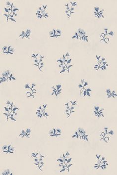 a blue and white wallpaper with flowers on it