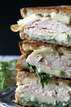 three sandwiches stacked on top of each other