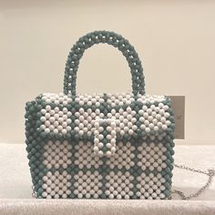 Bag Is Lulu Nyc Brand, Artisan Crafted. Beads Are Strung In A Plaid Pattern. Measures 6 Inches Tall By 7 Inches Long. Short Handle Is 3 Inches High And The Long Silver Chain Is 24 Inches High. There Is No Lining. Closure Is A Silver, Magnetic Snap. White Handheld Bag With Pearl Handle, White Bags With Pearl Handle For Daily Use, White Handheld Shoulder Bag With Pearl Handle, White Tote Bag With Pearl Handle, White Shoulder Bag With Pearl Handle For Daily Use, Daily Use White Shoulder Bag With Pearl Handle, White Shopping Bag With Pearl Handle, White Tote Shoulder Bag With Pearl Handle, White Everyday Bag With Pearl Handle