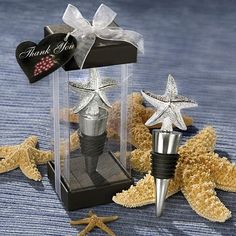 a starfish bottle stopper is sitting in a box