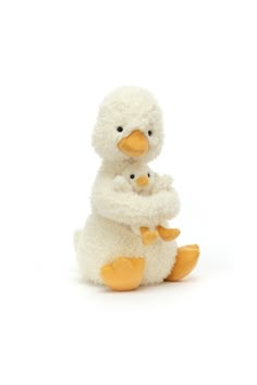 a stuffed duck and its baby sitting next to each other in front of a white background