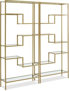 a gold metal shelf with glass shelves on each side and an open bookcase in the middle