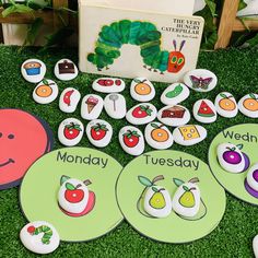 the very hungry caterpillars are on display in front of books and magnets