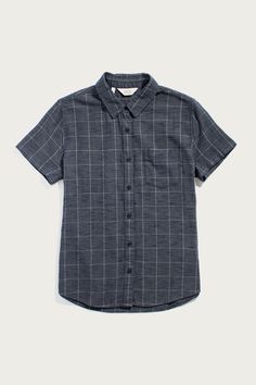 Returning this season, the Lana is a short sleeve button up with a simple chest pocket and cuffless sleeves. It has a relaxed fit that makes it a seamless layering piece. 100% Organic Cotton Sustainable Series Windowpane fabric with unique weave design Straight Fit Single chest pocket Machine wash cold with mild detergent. Line dry or tumble dry low. Warm iron if needed. Do not bleach. Plaid Short Sleeve Shirt For Everyday, Short Sleeve Shirt With Welt Pockets For Everyday, Plaid Short Sleeve Shirt With Relaxed Fit, Lana Shirt, Overalls And Sweater, Company Gifts, Short Sleeve Button Up, Layering Pieces, Mens Socks