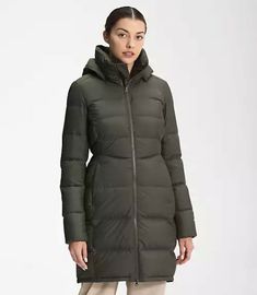 The North Face Women’s Metropolis Parka The North Face Color: New Taupe Green Size M Retail Price $300 The slim-fit Women's Metropolis Parka is a form-flattering, water-resistant, 550-fill Down jacket that keeps your upper body, hips and thighs cozy and protected from harsh winter weather. FEATURES Lightweight shell Brushed-tricot chin guard and collar lining Elongated back Ergonomic seams and quilted design Detachable hood Internal chest pocket Feminine silhouette Clean, invisible-zip pocket on Northface Coats, North Face Metropolis Parka, North Face Hyvent Jacket, North Face Jacket Women's, Down Parka Women, Long Winter Jacket, Triclimate Jacket, North Face Hyvent, Harsh Winter