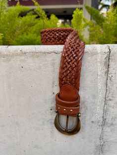 The Free People Brix Belt is a classic leather belt featuring a detailed woven band and chunky Western buckle for a chic touch. Color: Cognac, Black, Oyster Mauve 100% Leather Palm Beach Gardens Florida, Western Buckles, Palm Beach Gardens, Classic Leather, Black Belt, Leather Belt, Cognac, Free People, Buckle