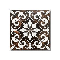 a square tile with an intricate design on the top and bottom, in brown and white