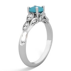 Feauturing flowing filigree scrolls and delicate milgrain accents, this turquoise turquoise ring in 14K White Gold is truly unique. Ten sparkling diamonds are nestled among the intricate details of this one-of-a-kind piece. Elegant Turquoise Diamond Ring, Elegant Turquoise Diamond Ring With Center Stone, Elegant Diamond Turquoise Ring For Anniversary, Elegant Turquoise Diamond Ring For Anniversary, Elegant Turquoise Ring With Diamond Accents, Elegant Turquoise Ring, Elegant Turquoise Ring With Diamond Accents As Gift, Elegant Turquoise Ring With Accent Stones, Elegant Turquoise Ring With Center Stone