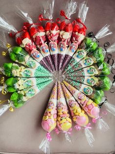 a bunch of candy sticks sitting on top of a table