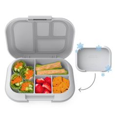 a bento box filled with different types of food next to a container containing strawberries, celery and carrots