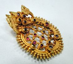 22 K solid gold peacock pendant. A fully handmade piece in very good condition. Size-3.5/4.5 cm, weight-16.190 grams. Gold Peacock, Gold Jewellry, Peacock Pendant, Antique Bridal Jewelry, Gemstone Pendant Necklace, Silver Anklets, 925 Silver Earrings, Gemstone Necklace Pendant, Ruby Gemstone