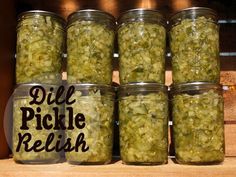 six jars filled with pickle relish sitting on a shelf