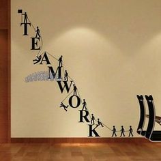 this is an image of a wall with the words teamwork on it