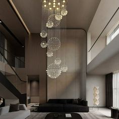 a modern living room with chandelier hanging from the ceiling