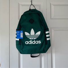 A Green Adidas Backpack Is A Stylish And Practical Accessory For Your Daily Needs. Adidas Is Known For Its Quality And Sporty Designs, And This Backpack Is No Exception. The Green Color Adds A Pop Of Vibrancy, Making It A Fashionable Choice For Carrying Your Essentials. Whether You're Using It For School, Work, Or As A Gym Bag, This Adidas Backpack Offers Both Functionality And Style. Embrace The Sporty-Chic Aesthetic And Practicality Of This Green Backpack, And Enjoy A Versatile Addition To You Green Bags For Back To School Streetwear, Sporty Green Backpack With Adjustable Strap, Sporty Green Backpack For School, Sporty Green Bags For Streetwear, Casual Logo Backpack For Everyday Use, Casual Nylon Backpack With Logo, Casual Everyday Backpack With Logo, Sporty Green Backpack For Back To School, Casual Backpack With Logo For Daily Use