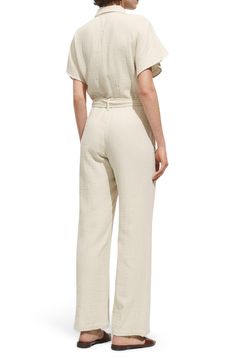 Swing into the office or brunch in this kicky wide-leg jumpsuit boasting a marbled, tonal buckle on the matching belt and convenient side pockets for on-the-go storage. Front button closure Point collar Short sleeves Removable belt Side-seam pockets 100% cotton Machine wash, line dry Imported Jumpsuit Mango, Favorite Daughter, Platform Slippers, Blazer With Jeans, Maternity Shops, Pointed Toe Shoes, Suit Separates, Modern Outfits, Designer Clothes For Men