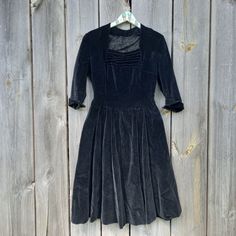 50s-60s Vintage dress for women. Black Velvet Party Dress   Evening bodycon dress Size S   The dress does not stretch   Cotton/ Polyester Measurements: Shoulders 16 inch, 40.5 cm Bust 36inch, 91cm Waist 28inch, 71cm Length on the back 44inch, 111.5cm Sleeve 17.5 inch, 44cm Fitted A-line Vintage Dress For Winter, Fitted A-line Vintage Dress For Party, Knee-length Vintage Dress For Fall Party, Vintage Knee-length Dress For Costume Party, Fitted Vintage A-line Dress For Winter, Fitted Midi Dress For Spring Costume Party, Retro Black Cocktail Dress, 1950s Style Midi Evening Dress, Elegant Fitted Vintage Dress For Costume Party