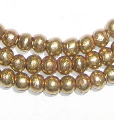 three strands of gold colored glass beads