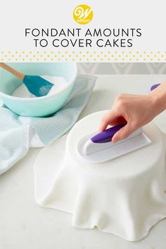 a person using an iron on top of a white table with the words fondant amounts to cover cakes