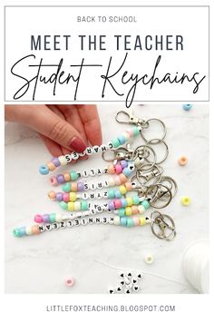 the back to school student keychais are made with colorful beads and letters that spell out