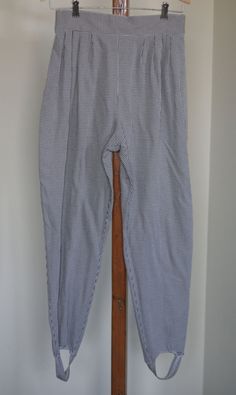 "vintage stirrup pants . label says size 12 but probably a 2. rayon/polyester blend. two inch waist band in the front and elastic in the back. black and white check. front pleats. fabric stirrup. these would look great with a wide belt and heels! good vintage condition. marked sag harbor radcliffe. waist (with elastic UNstretched)  28\" hip  approx 48\" ( these are meant to be roomy) inseam (not including stirrup)  26\"" Vintage Fitted Bottoms For Loungewear, Fitted Vintage Bottoms For Loungewear, Vintage Fitted Loungewear Bottoms, Fitted Plaid Cotton Bottoms, Fitted Ankle-length Pants For Daywear, Fitted Ankle-length Daywear Pants, High Waist Fitted Pants For Daywear, Fitted High Waist Pants For Casual Wear, Fitted Gingham High-waisted Pants