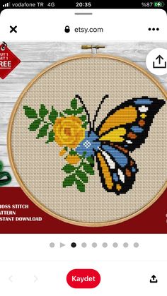 the cross stitch pattern is being displayed on an iphone screen, and it's not in