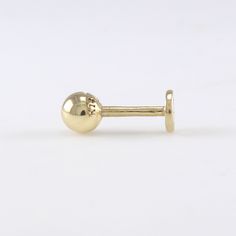 14K Solid Gold 4mm Ball Stud Labret, Cartilage, Tragus, Helix, Conch, Lobe, 14K Solid Gold Piercing Earring, Minimalist Earring, Simple Stud, Geometric Earring Please note that this earring is made to order. S P E C S ♦ All of our jewelry is handmade in our studio in Seoul, Korea. ♦ 14K Gold (available in white, yellow, or rose) ♦ Ball Size 4 mm in diameter ♦ Post Thickness: 1mm / 18 Gauge ♦ Total Length of Post : 8mm ♦ Backing Type : Threaded Screw Back, 4 mm in Diameter ♦ Listing is for 1 earr Classic Adjustable Single Cartilage Earring, Classic Adjustable Pierced Cartilage Earrings, Adjustable 14k Gold Cartilage Single Earring, Adjustable Round Yellow Gold Cartilage Earrings, Adjustable 14k Gold Single Cartilage Earring, Adjustable Classic Round Cartilage Earrings, Classic Adjustable Round Cartilage Earrings, Rose Ball, Earring Simple