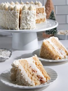 two pieces of cake sitting on plates next to each other