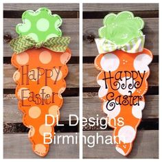 two orange and green signs with the words happy easter and happy easter written on them