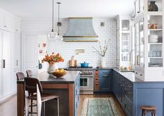 the kitchen is clean and ready to be used for cooking or eating, while also being used as a dining area