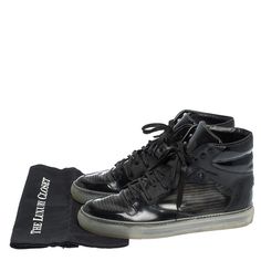 The unique leather and PVC patchwork construction of these Balenciaga sneakers gives them standout style for Instagram ready casual looks. Crafted in Italy with silver hardware and a tactile mix of textures, these high tops in a classic black will take your feed to the next level of cool comfort whether rocking the streets or lounging indoors. Patent Leather Lace-up Sneakers With Rubber Sole, Lace-up Patent Leather Sneakers With Rubber Sole, Lace-up Patent Leather Sneakers With Textured Sole, Designer Leather Sole Lace-up Sneakers, Casual Patent Leather Sneakers With Round Toe, Designer Lace-up Sneakers With Leather Sole, Custom High-top Leather Sneakers With Perforated Toe Box, High-top Lace-up Sneakers With Leather Sole For Sports, Leather High-top Sneakers For Streetwear With Flat Heel