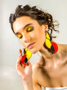 These big 80's-style, crescent-shaped earrings are hand-embroidered with crystals, Japanese beads, and embroidery floss. They come in the bright colours of sunrise. Pair them with your casual everyday wear for a stylish retro vibe. We have currently updated the look of this piece by using Japanese silk to wrap around the shapes to replace the hand embroidery. This makes the piece shinier and more versatile to wear. Unique Embroidered Jewelry For Party, Unique Hand Embroidery, Style Année 80, Shoulder Jewelry, Body Necklace, Crescent Earrings, Japanese Beads, Casual Earrings, Gold Bodies