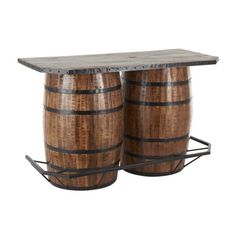 two wooden barrels with metal straps on each side and one is holding a shelf for storing wine