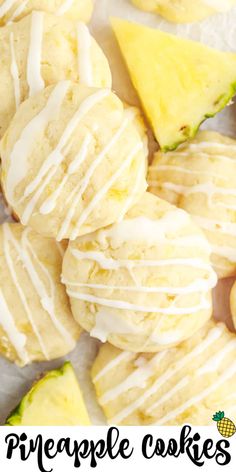 pineapple cookies with white icing and sliced pineapples in the background text reads pineapple cookies