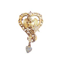 "Vintage Signed Kirks Folly Dangle Heart Brooch (A1935) Size: 2\". Color: Gold Condition: Very good vintage Signed: Kirks Folly Details: Beautiful and attractive. Please look at all the photos, as they are part of the description. I try my best to point out any flaws. Also please remember this is a preloved piece and may show signs of light wear, marks, scratches, etc. I will be posting a lot more jewelry, Keep checking back." Vintage Wedding Brooches For Valentine's Day, Vintage Brooch Jewelry For Valentine's Day, Vintage Brooch For Valentine's Day, Vintage Valentine's Day Jewelry Brooch, Vintage Heart-shaped Wedding Brooches, Vintage Heart-shaped Brooch Jewelry, Vintage Heart Shaped Brooch Jewelry, Vintage Gold Heart Brooches, Vintage Heart Shaped Brooch