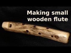 a wooden flute with the words making small wooden flute flutes on it's side