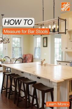 a kitchen island with stools in it and the words how to measure for bar stools