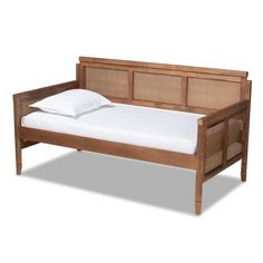 a wooden bed frame with white sheets and pillows on it's headboard, against a white background