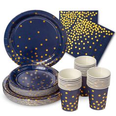 a blue and yellow table setting with polka dot plates, cups, napkins and place mats