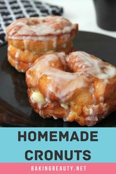 two glazed donuts on a black plate with text that reads copycat cronut recipe baking beauty net