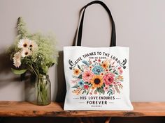 This Faith Tote bag captures a positive and uplifting message and a reminder that God will take care of you. This is a medium size tote bag perfect for daily use, work, school, shopping, travel bag, or for gift giving for any celebratory occasion.   **PROCESSING ORDERS** Our processing time is within 2-5 business days.  Although our production partners aim to get these processed within their timeframe, please be aware of unusual delays beyond our control such as large volume orders, courier dela Inspirational Bags For Daily Use And Mother's Day, Inspirational Bags For Mother's Day Gift, Uplifting Messages, Soft Bristle Brush, Faith Based, Stain Remover, Gift Giving, Travel Bag, Black Cotton