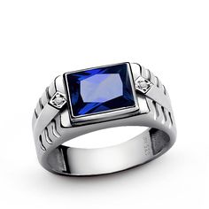 Metal: Sterling Silver Purity: 925 (hallmarked)Gemstone ctw: 3.40Cut: Rectangular FacetedSize: 8x10 mm (0.3"x0.4")Setting Type: BezelAccent Stones: DiamondsCarat Total Weight: 0.02Setting Type: PavéCut/Color/Clarity: Good/H/VS1 ------------------- Crafted from sterling silver, this edgy ring features 3.40 ct gemstone in a bezel setting accented by 2 sparkling diamonds. It's just unique enough to get you noticed without being overbearing. Mens Sapphire Ring, Mens Emerald Rings, Yellow Gold Mens Rings, Mens Gemstone Rings, Ruby Rings, Emerald Rings, Statement Rings Diamond, Ruby Pendant, Emerald Pendant